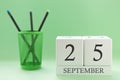 Desk calendar of two cubes for September 25 Royalty Free Stock Photo