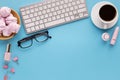 Desk with coffee cup and glasses, copy space