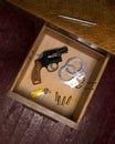 Desk Drawer Full of Self Defense Items and Gun Royalty Free Stock Photo