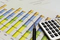 Desk with financial charts and histograms Royalty Free Stock Photo