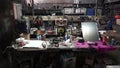 Desk of free space and workshop. Clip. Organized wall of tools and electricity plug. inside a workshop with large
