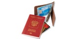 Desk of frequent traveler - angle view. The composition of essential items for trip: passport with multiple entry stamps, foreign Royalty Free Stock Photo