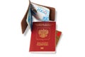 Desk of frequent traveler - angle view. The composition of essential items for trip: passport with multiple entry stamps, foreign Royalty Free Stock Photo