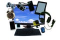 Desk with gadgets or electronic equipment for daily use, Computer desktop pc, cell phones, gaming headset and digital camera isola Royalty Free Stock Photo