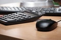 Desk table with keyboard, calculator and mouse Royalty Free Stock Photo