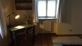 Desk and lamp in room, Copsa Mare, Transylvania, Romania