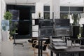 Desk with multiple pc monitors compiling terminal window Royalty Free Stock Photo