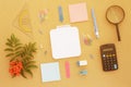 Desk with paper, pen, calculator, magnifier and ruler Royalty Free Stock Photo