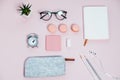 Desk on pink glasses notepad kicking pencils plant macaroons ala