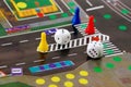 Desk play road rules with chips and cubes Royalty Free Stock Photo