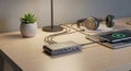 Desk setup features a sleek USB hub with multiple ports including Royalty Free Stock Photo