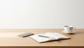 Desk setup featuring a wooden surface. Items include a smartphone an Royalty Free Stock Photo