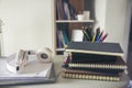 Desk for student education concept. Book, and pencil for study for exam. Laptop and headphone placed on white School table with Royalty Free Stock Photo