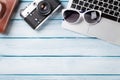 Desk table with laptop and camera Royalty Free Stock Photo