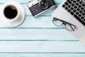 Desk table with laptop and camera Royalty Free Stock Photo