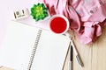 Desk table with scarf, open notebook paper and cube calendar Royalty Free Stock Photo