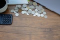 On the desk, there is a silver coin placed on it Royalty Free Stock Photo