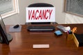 Desk and Vacancy Sign Royalty Free Stock Photo