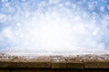 Desk of Wood and Snow - blue blurred background of winter and old shabby table