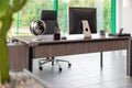 A Desks is located in a modernly furnished office Royalty Free Stock Photo