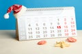 Desktop calendar and Christmas cap Royalty Free Stock Photo