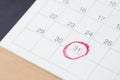 Desktop calendar with red circle on last day, 31 important resignation date, end of month, reminder and schedule or project plan Royalty Free Stock Photo