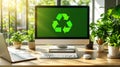 Desktop computer with green recycle symbol on screen and plants 2 Royalty Free Stock Photo