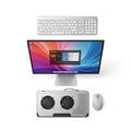 Desktop computer setup featuring a large screen displaying a colorful Royalty Free Stock Photo
