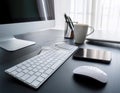 Desktop computer setup, including accessories like keyboard and mouse, representing office work, productivity, and tech Royalty Free Stock Photo