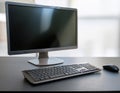 Desktop computer setup, including accessories like keyboard and mouse, representing office work, productivity, and tech Royalty Free Stock Photo