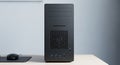 Desktop computer tower with a minimalist design sits on a ligh Royalty Free Stock Photo