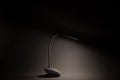 Desktop flexible LED lamp on the battery shines in the dark, light and technology, light