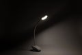 Desktop flexible LED lamp on the battery shines in the dark, light and technology, light