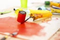 desktop graphics with a roller with red paint Royalty Free Stock Photo