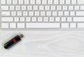 Desktop with keyboard and data thumb drive Royalty Free Stock Photo