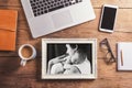 Desktop mix on a wooden office table. Royalty Free Stock Photo