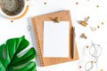 Desktop mock up planner. Flat lay of white working table background with cup of coffee putting on it. Top view glasses, leaf, Royalty Free Stock Photo