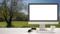 Desktop mockup, template, computer on work desk with white blank screen, keyboard mouse and notepad with pens and pencils, green m Royalty Free Stock Photo