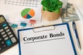 Paper with Corporate Bonds on a tabl