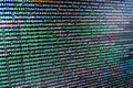 Desktop PC monitor photo. Hacker breaching net security. IT coding on monitor screen. Royalty Free Stock Photo