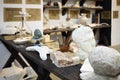 Desktop of sculptor with plaster head, tools, Royalty Free Stock Photo