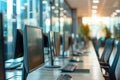 Desktop setup in an office with computer monitors and keyboards Royalty Free Stock Photo