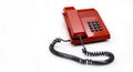 Desktop telephone from the 80`s and red color isolated on a white background. Space for text Royalty Free Stock Photo