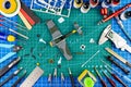 Desktop view from above of assembly and painting of retro scale model fighter plane concept background. modeling tools airbrush Royalty Free Stock Photo
