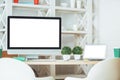 Desktop with white computer screen Royalty Free Stock Photo