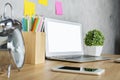 Desktop with white laptop Royalty Free Stock Photo