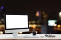 Desktop on work table and city night background Royalty Free Stock Photo