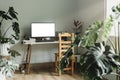 Desktop workspace with connect to laptop with HDMI cable split screen mock up monitor leaving space for text And stacks of books