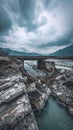 The desolate remains of a once-busy bridge stand under brooding cloudy skies, a stark reminder of nature's