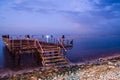 Desolated Dock On Sunset With Calm Sea Royalty Free Stock Photo